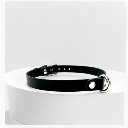 Adjustable black leather choker with silver mini D-ring, handcrafted in USA