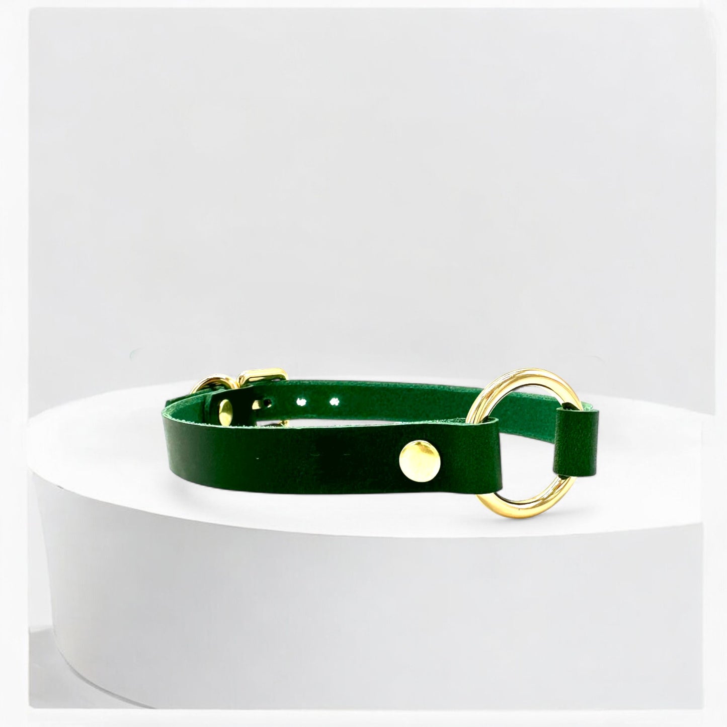 Angled view green O-Ring leather choker with gold hardware detail