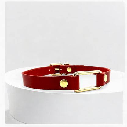 Angled view red rectangle-link choker with gold hardware detail