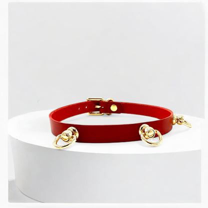 Angled view red triple O-Link leather choker with gold hardware detail
