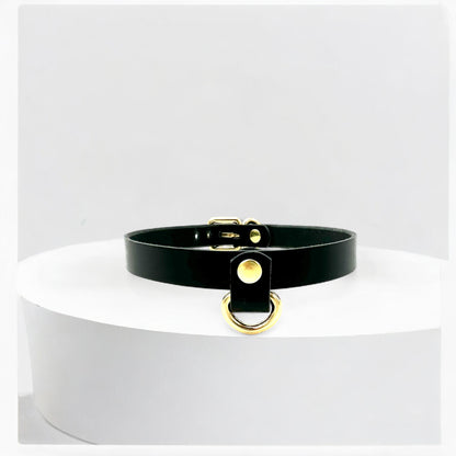 Close-up of black Italian leather Drop Mini D-Ring Choker with silver details