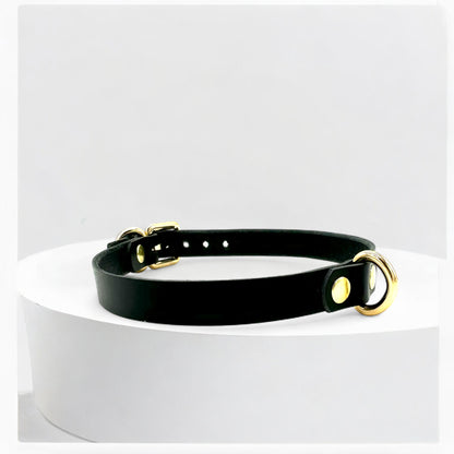 Side view of black Mini D-Ring Leather Choker with gold hardware, slim and minimal