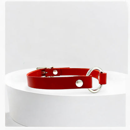 Close-up red leather O-Ring choker with silver ring detail