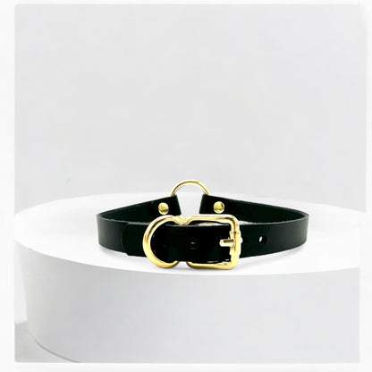 Flatlay black O-Ring leather choker with gold hardware