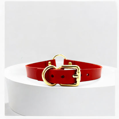 Flatlay red O-Ring leather choker with gold hardware