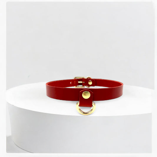 Close-up of red Italian leather Drop Mini D-Ring Choker, detailed silver hardware